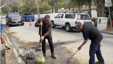 Watch: Arnold Schwarzenegger fixes 'giant pothole' in California neighbourhood