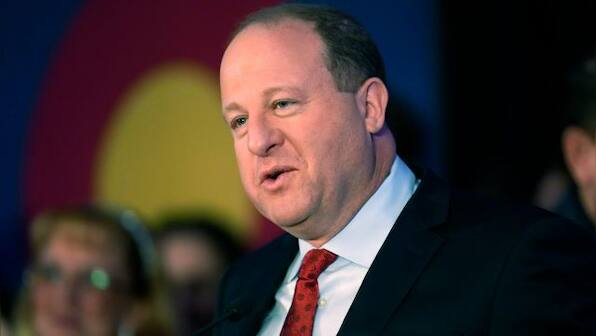 Colorado governor signs package of healthcare measure to guarantee access for abortion, transgender care