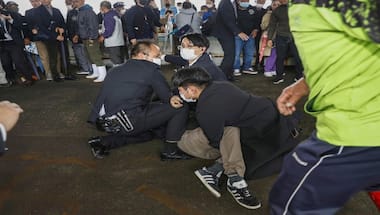 Japan PM resumes campaigning after evacuation from 'smoke bomb' blast