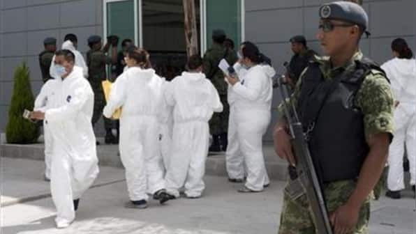 Police find tons of liquid meth stored in Tequila bottles at Mexican port