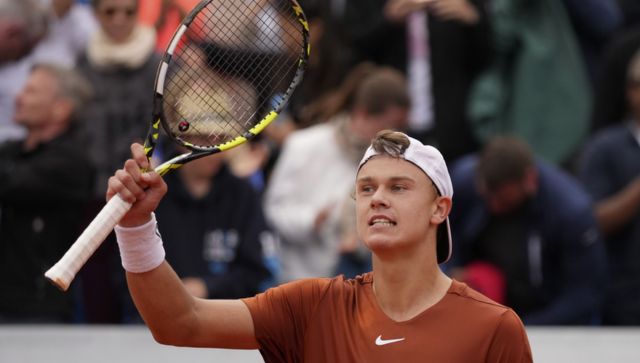 Struggling Holger Rune saves four match points to win second straight Munich title Struggling Holger Rune saves four match points to win second straight Munich title
