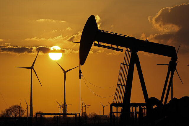 Oil producers' cuts could boost gasoline prices, help Russia