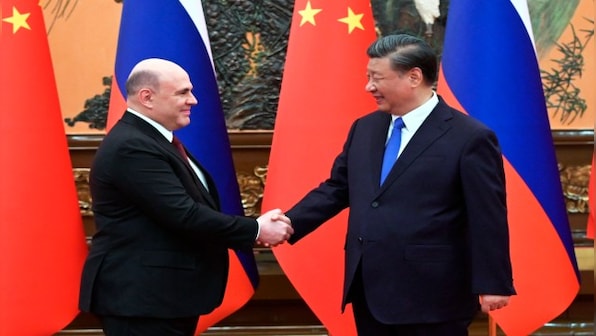 Russian premier in China talked about hi-tech and money, but will money still be around in future?