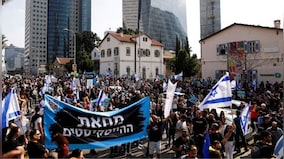 Number of Israeli cities strike in protest over tax plan as budget deadline looms