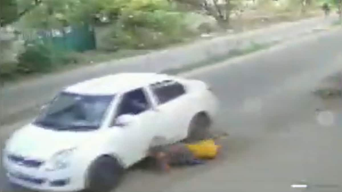 On Cam: Woman's narrow escape from falling under wheels during chain-snatching attempt