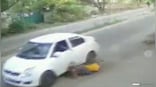 On Cam: Woman's narrow escape from falling under wheels during chain-snatching attempt