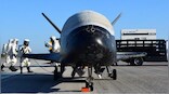 China's 'secretive' spacecraft returns to Earth after 9 months orbital mission