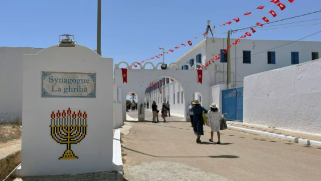 Two Jewish pilgrims and security guards die as cop opens fire in Tunisia synagogue Two Jewish pilgrims and security guards die as cop opens fire in Tunisia synagogue