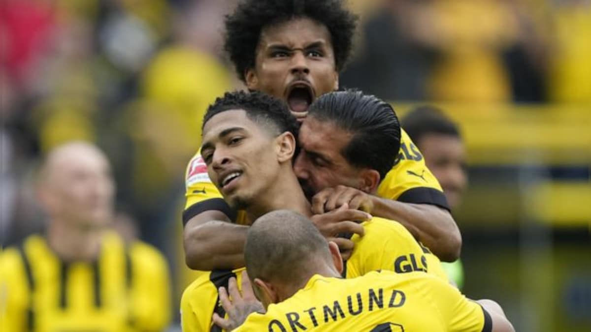 Bundesliga: Jude Bellingham brace helps six-goal Dortmund keep pace with Bayern Munich