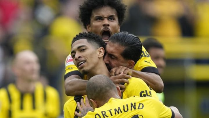 Bundesliga: Jude Bellingham brace helps six-goal Dortmund keep pace with Bayern Munich