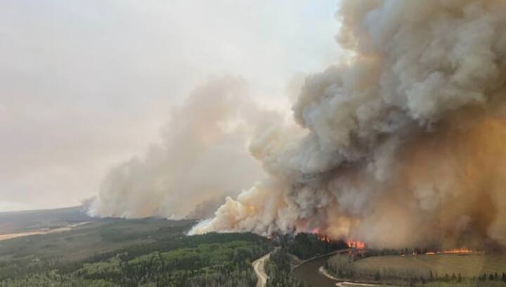 'Unprecedented crisis': Out-of-control wildfires in Western Canada force 25,000 to flee homes