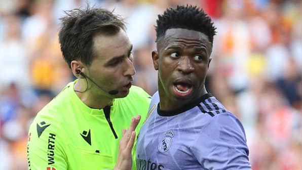 Vinicius has red card overturned after suffering racial abuse; Valencia stand closed, club fined