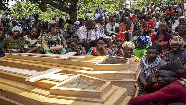 Dorms set on fire, students cut with machetes: What we know about Uganda's deadliest school attack