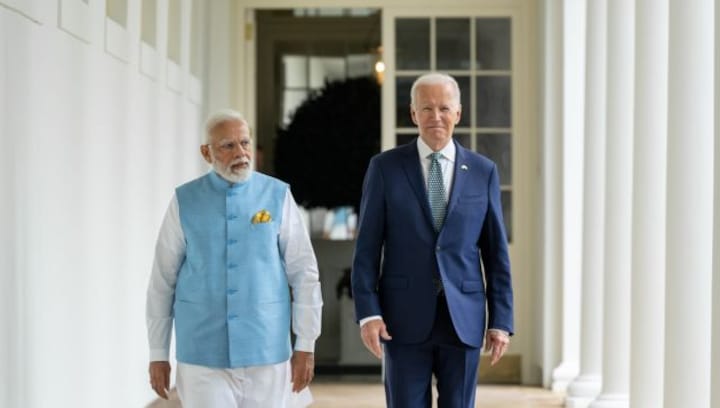 India lifts tariffs on US apples, pulse crops after PM Modi meets with Biden