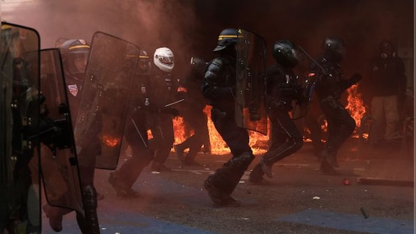 France unrest: Policeman who killed teen says sorry as violence intensifies