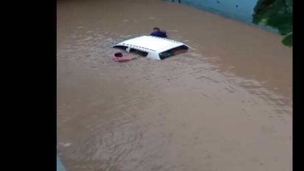 WATCH: Car submerges in water-logged underpass in Gujarat's Navsari, four occupants rescued