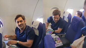 Watch: MS Dhoni plays Candy Crush as air hostess offers him chocolates