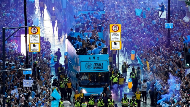 Watch: Manchester City enjoy historic treble with bus parade despite rain Watch: Manchester City enjoy historic treble with bus parade despite rain