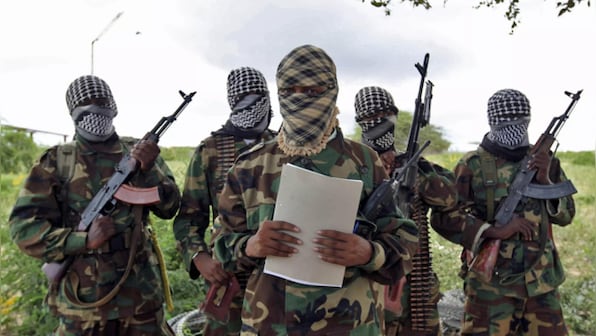 Militants kill 25, abduct others in attack on Ugandan school, police and military say