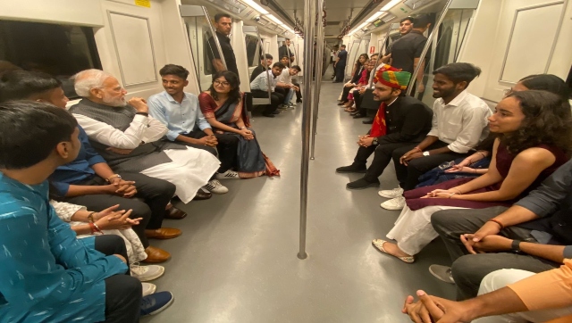 WATCH: PM Modi takes Metro to attend Delhi University centenary celebrations, interacts with commuters WATCH: PM Modi takes Metro to attend Delhi University centenary celebrations, interacts with commuters