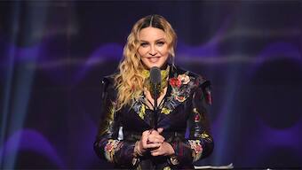 Madonna spends several days in an intensive care unit after becoming ill, postpones upcoming Celebration tour