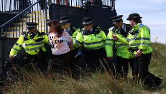British Open 2023: Just Stop Oil activists disrupt play throwing orange substance on 17th green