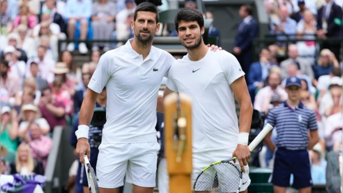 Djokovic - half volley, Novak Djokovic stretching to hit a …