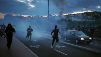 France unrest: Youths clash with police, loot stores as protests sweep country