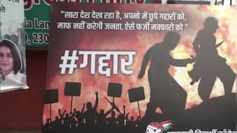 WATCH: 'Gaddar' posters emerge for Ajit Pawar, Praful Patel as Sharad Pawar in Delhi for NCP national executive meet