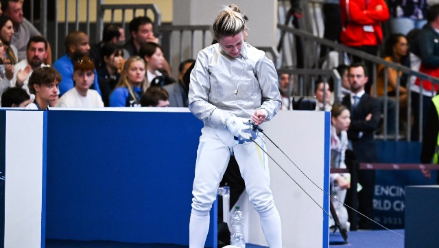 Ukraine's Olga Kharlan disqualified after refusal to shake hands with Russian opponent at Fencing World Championships Ukraine's Olga Kharlan disqualified after refusal to shake hands with Russian opponent at Fencing World Championships