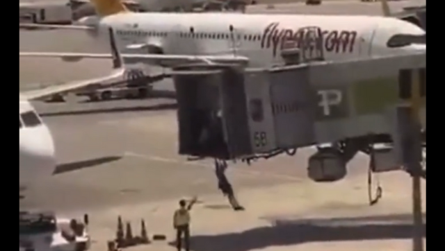 WATCH: Late to airport, Israeli man, two sons try to board aircraft on tarmac after jumping off boarding bridge WATCH: Late to airport, Israeli man, two sons try to board aircraft on tarmac after jumping off boarding bridge