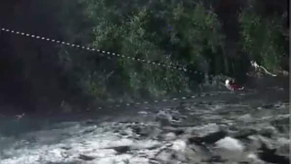 Watch: Late-night rescue by NDRF team across raging river