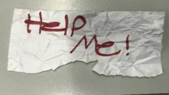Help Me! 13-yr-old girl rescued after flashing handwritten sign from kidnapper's car