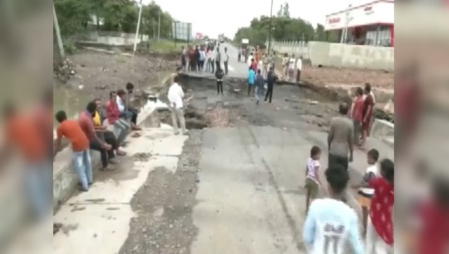 Heavy rainfall causes havoc in Telangana; roads, houses submerged Heavy rainfall causes havoc in Telangana; roads, houses submerged