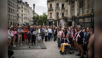 People across France show solidarity at town halls targeted in rioting following police shooting