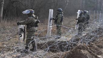 Poland accuses Belarus of violating its airspace, rushes troops to Eastern border