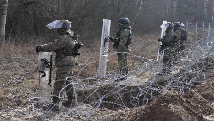 Poland accuses Belarus of violating its airspace, rushes troops to Eastern border