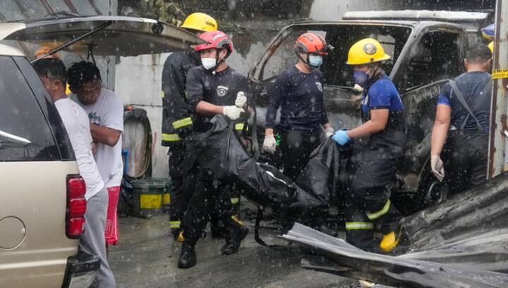 Rain, wrong address delayed firefighters reach Philippine factory blaze that left 15 dead
