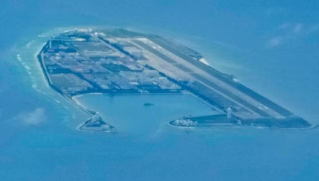 China appears to be constructing an airstrip on a disputed South China Sea island China appears to be constructing an airstrip on a disputed South China Sea island