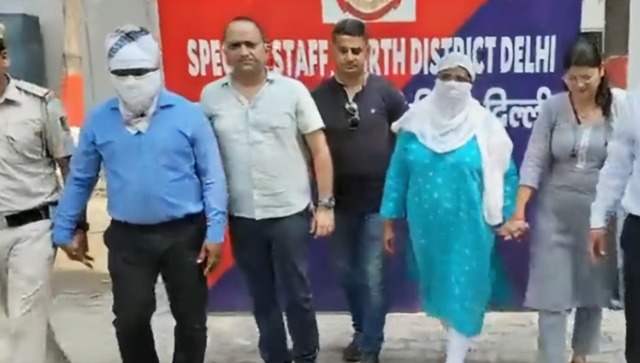 WATCH: Senior Delhi govt officer accused of raping friend's daughter tries to escape with wife ahead of arrest WATCH: Senior Delhi govt officer accused of raping friend's daughter tries to escape with wife ahead of arrest