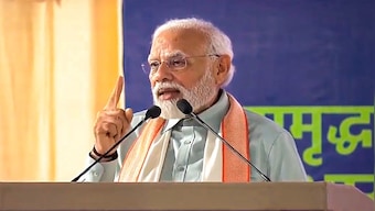 What is the Lokmanya Tilak award conferred upon PM Narendra Modi in Pune?