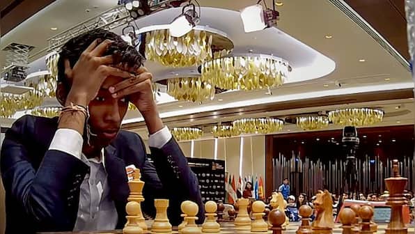 FIDE Chess World Cup R Praggnanandhaa plays out draw against Magnus Carslen in first game of final