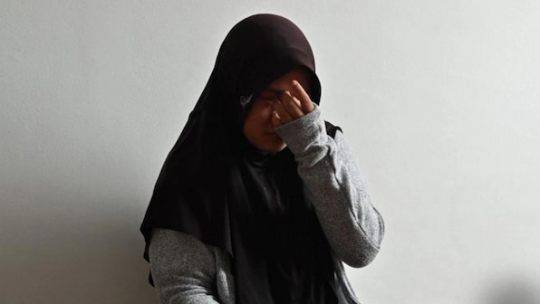 Indonesian maid forced to eat dog feces, kept on leash; employer jailed for 4 years