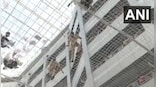 WATCH: Farmers jump in the well of Maharashtra Mantralaya building, use safety nets as bouncy
