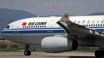 Air China jet evacuated after engine fire sends smoke into cabin in Singapore, nine injured