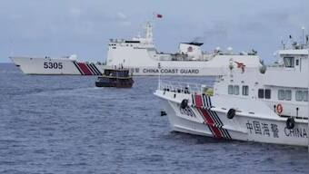 Philippines vows removal of Chinese barriers at disputed reef in South China Sea