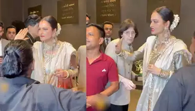 Watch: Rekha playfully 'slaps' a fan as he tries to click a picture with the actress Watch: Rekha playfully 'slaps' a fan as he tries to click a picture with the actress