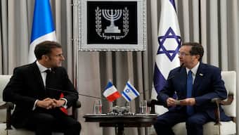France's Macron meets Israeli President Isaac Herzog, says releasing hostages must be 'first objective'
