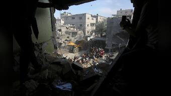 Israeli air strikes on residential blocks kill 32 in south Gaza amid calls for civilians to flee