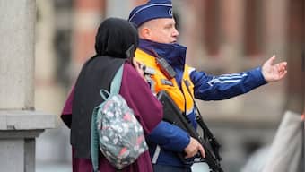 Brussels shooting: Gunman who murdered two Swedish football fans is shot dead by Belgian police